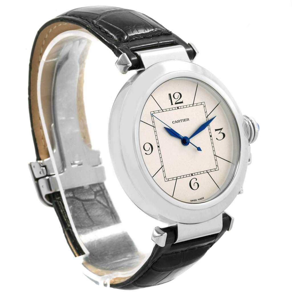 The image shows a Cartier Pasha W3107255 Men's Stainless Steel Silver Dial W3107255 Men's Stainless Steel Silver Dial watch at an angled side view, highlighting its round face, white dial, black leather strap, and blue hands.