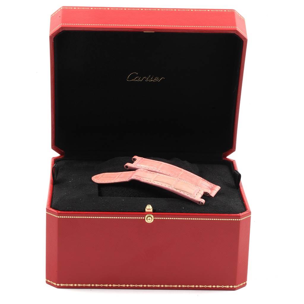 The image shows a pink strap for a Cartier Pasha Women's White Gold Silver Dial Women's White Gold Silver Dial watch inside an open, red Cartier box.