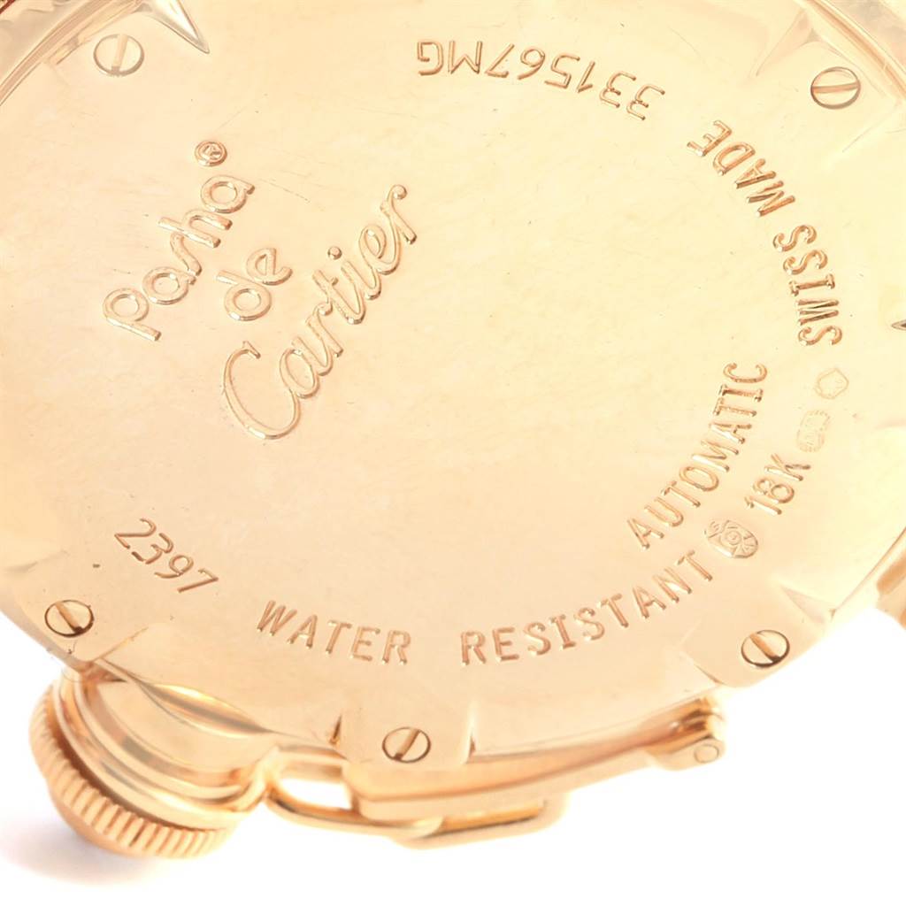 The image shows the back case of a Cartier Pasha 2397 Women's Yellow Gold Silver Dial 2397 Women's Yellow Gold Silver Dial watch, highlighting its engravings and details.