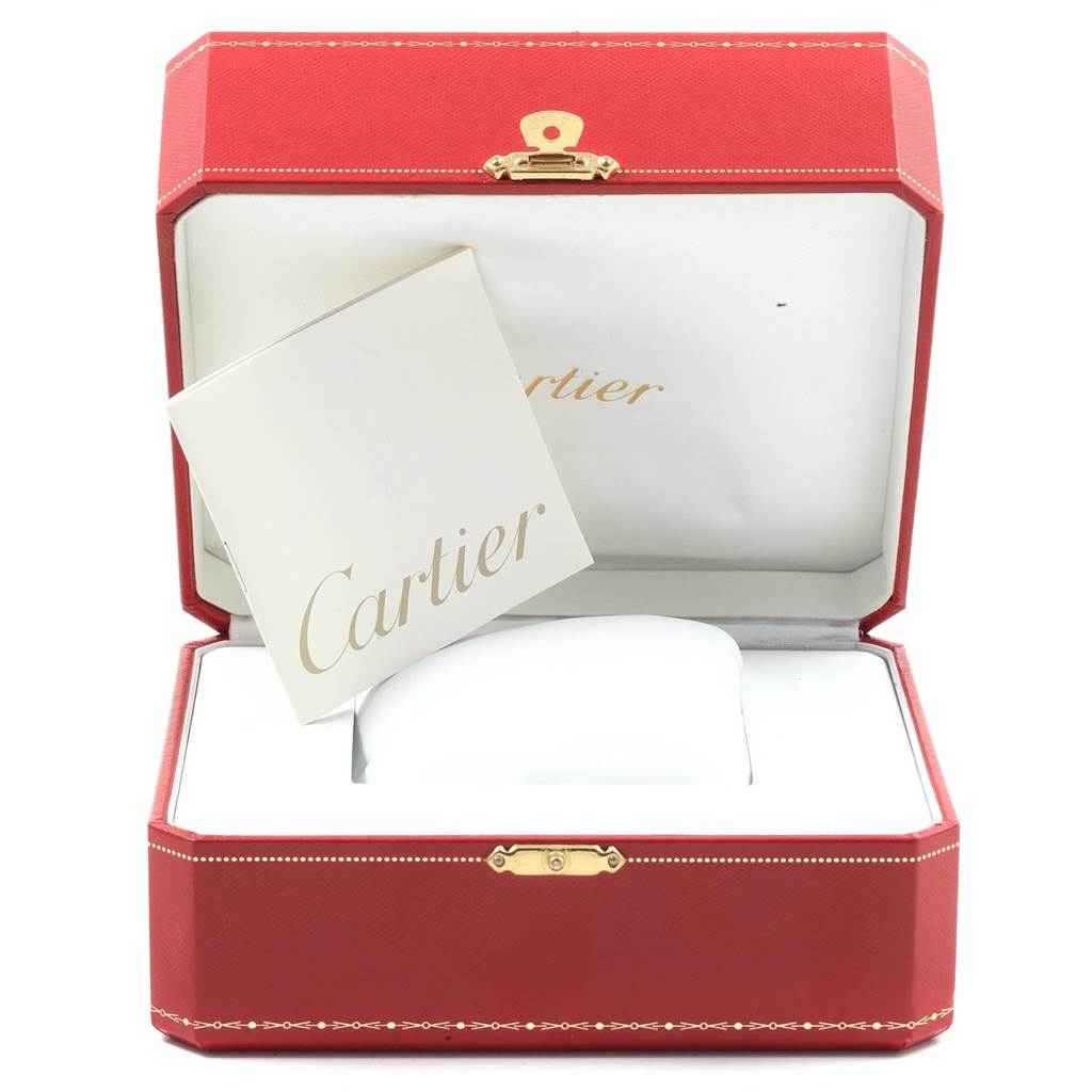 The image shows the opened box and manual for a Cartier Pasha 2397 Women's Yellow Gold Silver Dial 2397 Women's Yellow Gold Silver Dial watch.