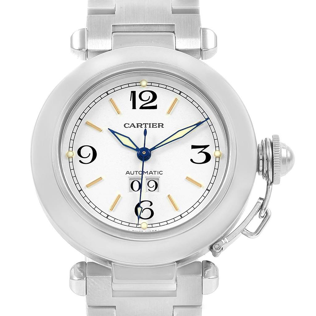 The image shows a Cartier Pasha W31044M7 Men's Stainless Steel White Dial W31044M7 Men's Stainless Steel White Dial watch front view, displaying its face, hands, bracelet, and crown cover.