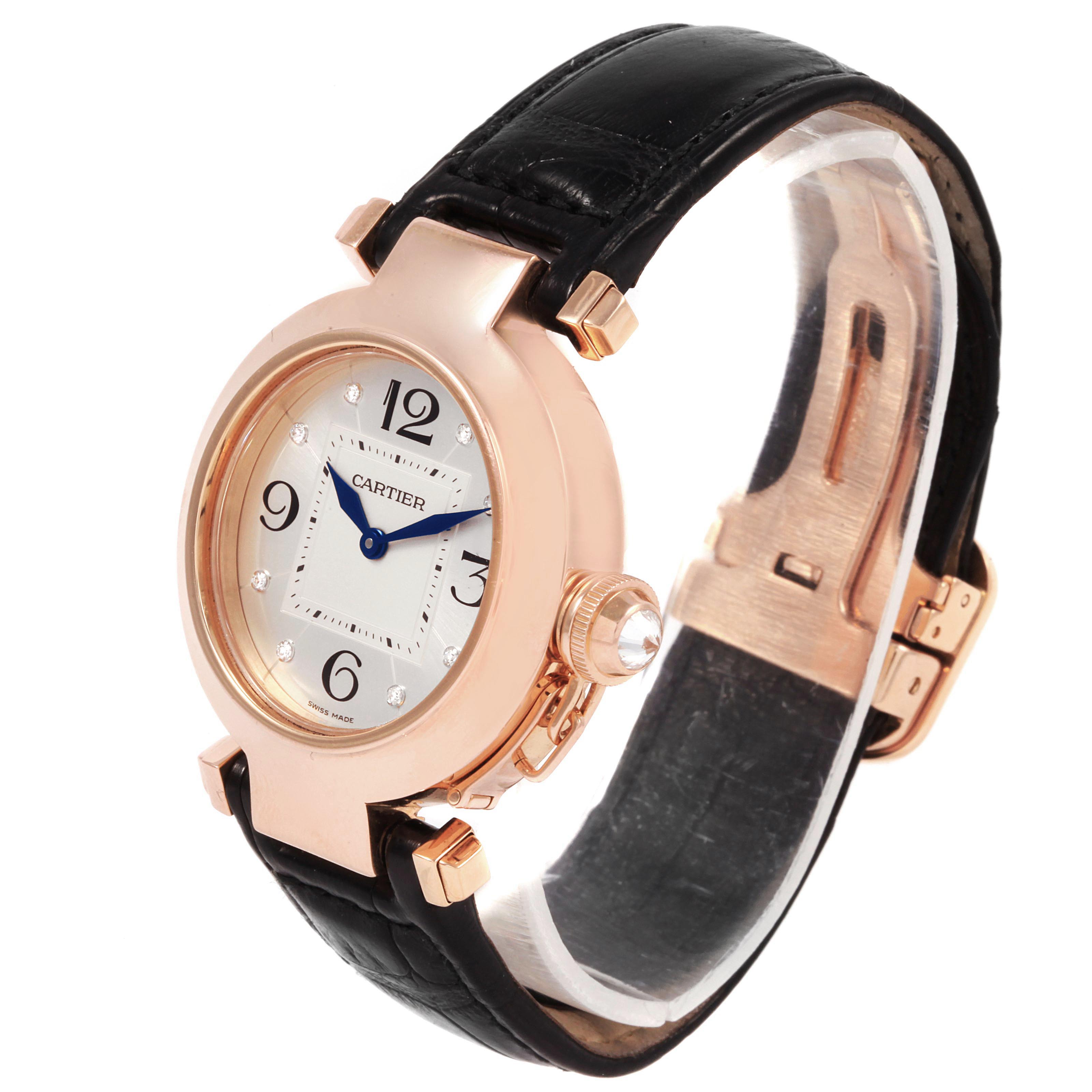 The Cartier Pasha WJ11913G Women's Rose Gold Silver Dial WJ11913G Women's Rose Gold Silver Dial watch is shown at a slight angle, displaying its rose gold case, crown, and black leather strap.