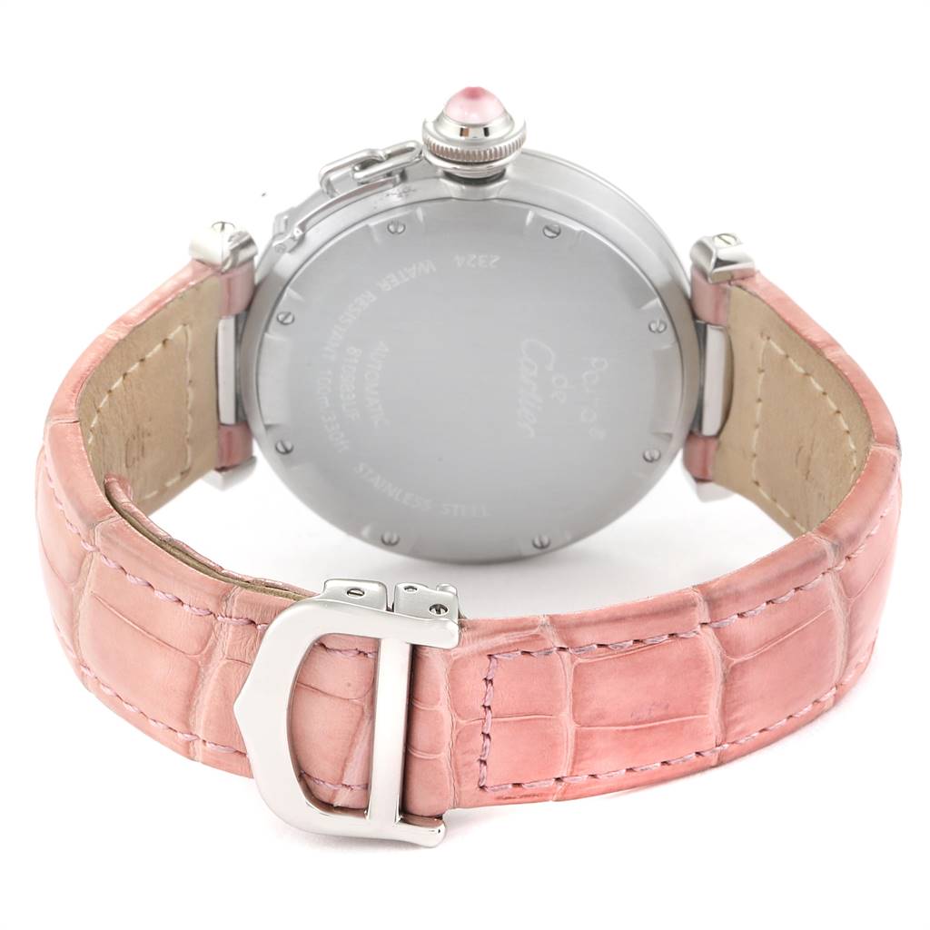 This image shows the back of a Cartier Pasha 2324 Women's Stainless Steel Mother of Pearl Dial 2324 Women's Stainless Steel Mother of Pearl Dial watch with a pink leather strap and clasp.