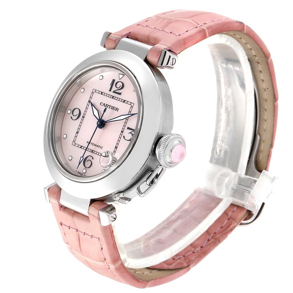 The Cartier Pasha 2324 Women's Stainless Steel Mother of Pearl Dial 2324 Women's Stainless Steel Mother of Pearl Dial watch is shown at a front angle highlighting the pink dial, bezel, crown, and pink leather strap.