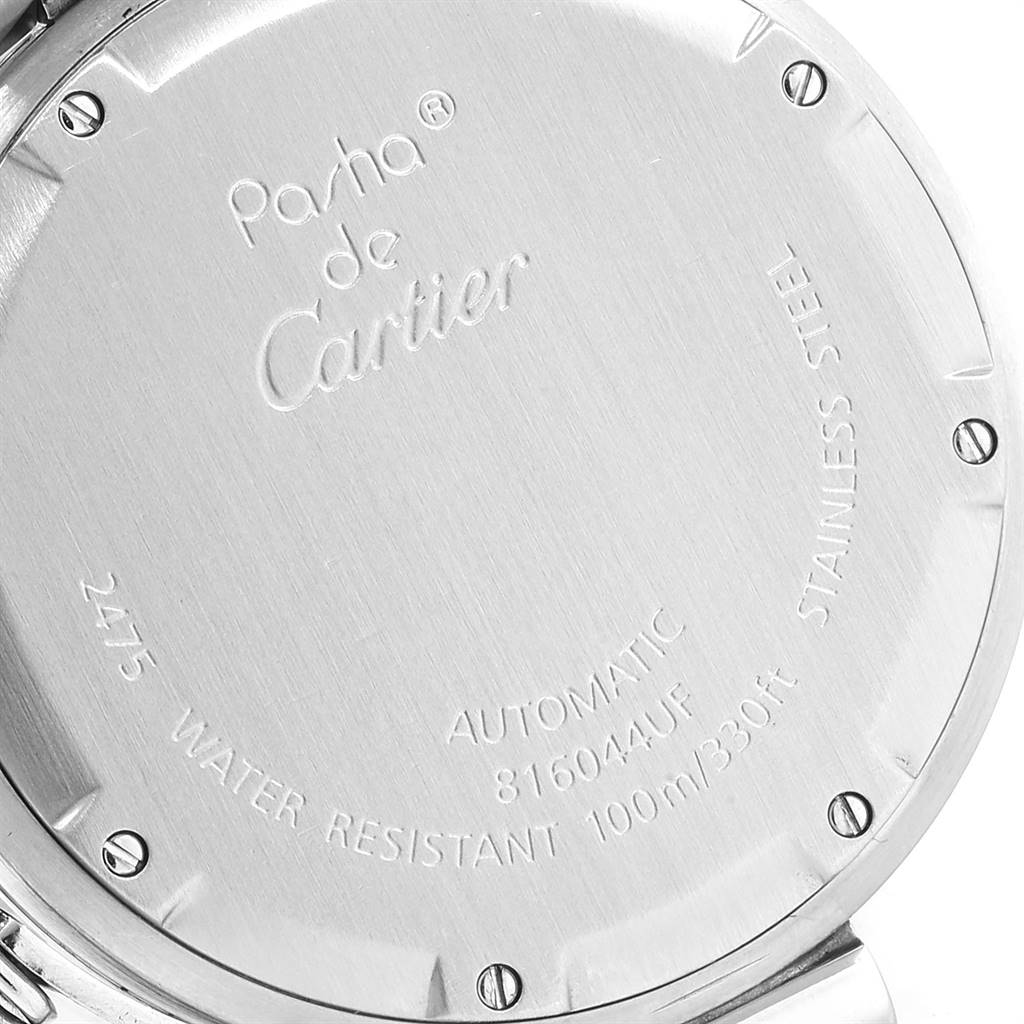 This image shows the back case of a Cartier Pasha W31058M7 Women
s Stainless Steel Pink Dial W31058M7 Women
s Stainless Steel Pink Dial Automatic watch, highlighting the engraved details and screw-down design.