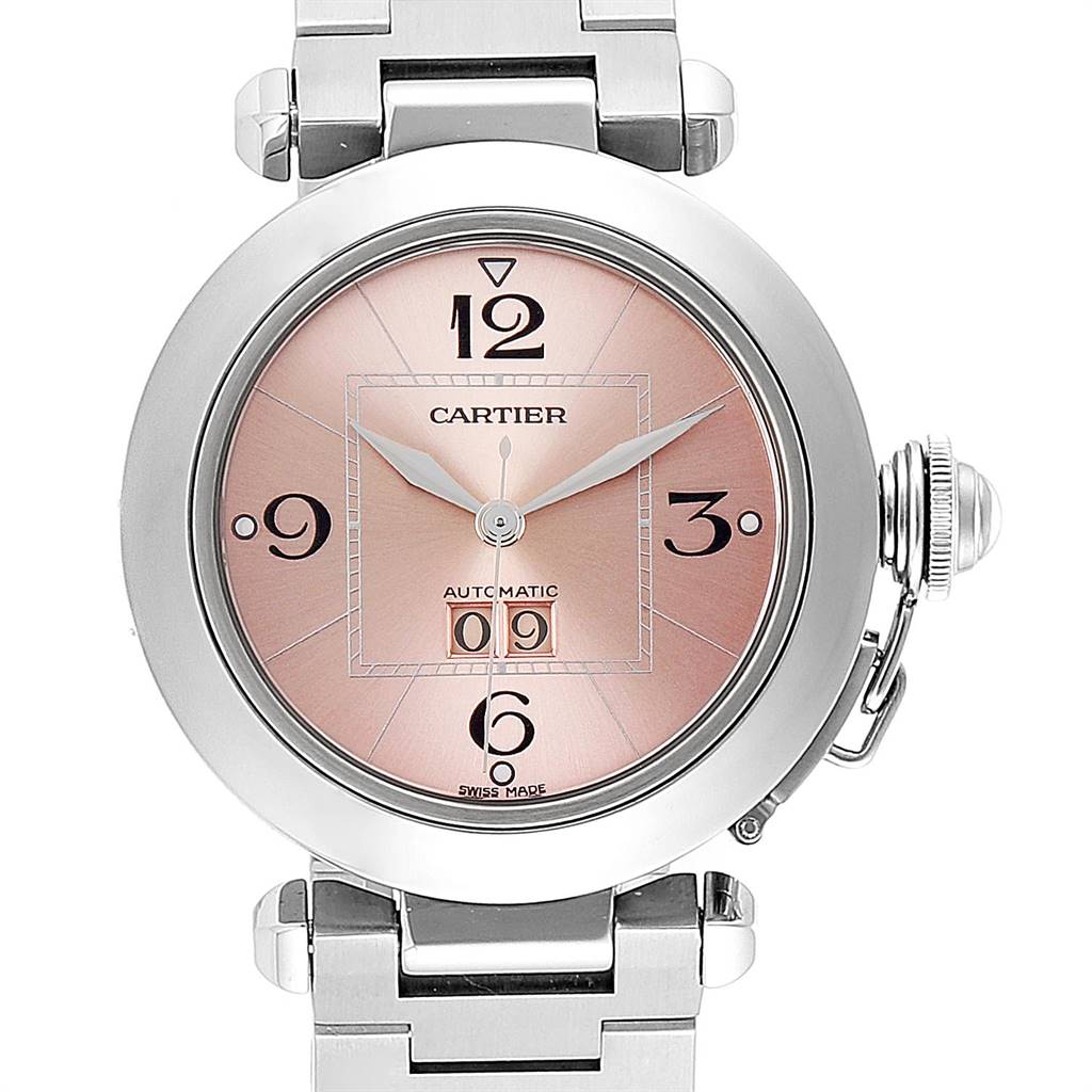 The image shows a front view of the Cartier Pasha W31058M7 Women
s Stainless Steel Pink Dial W31058M7 Women
s Stainless Steel Pink Dial watch, highlighting its pink dial, numerals, and metal bracelet.