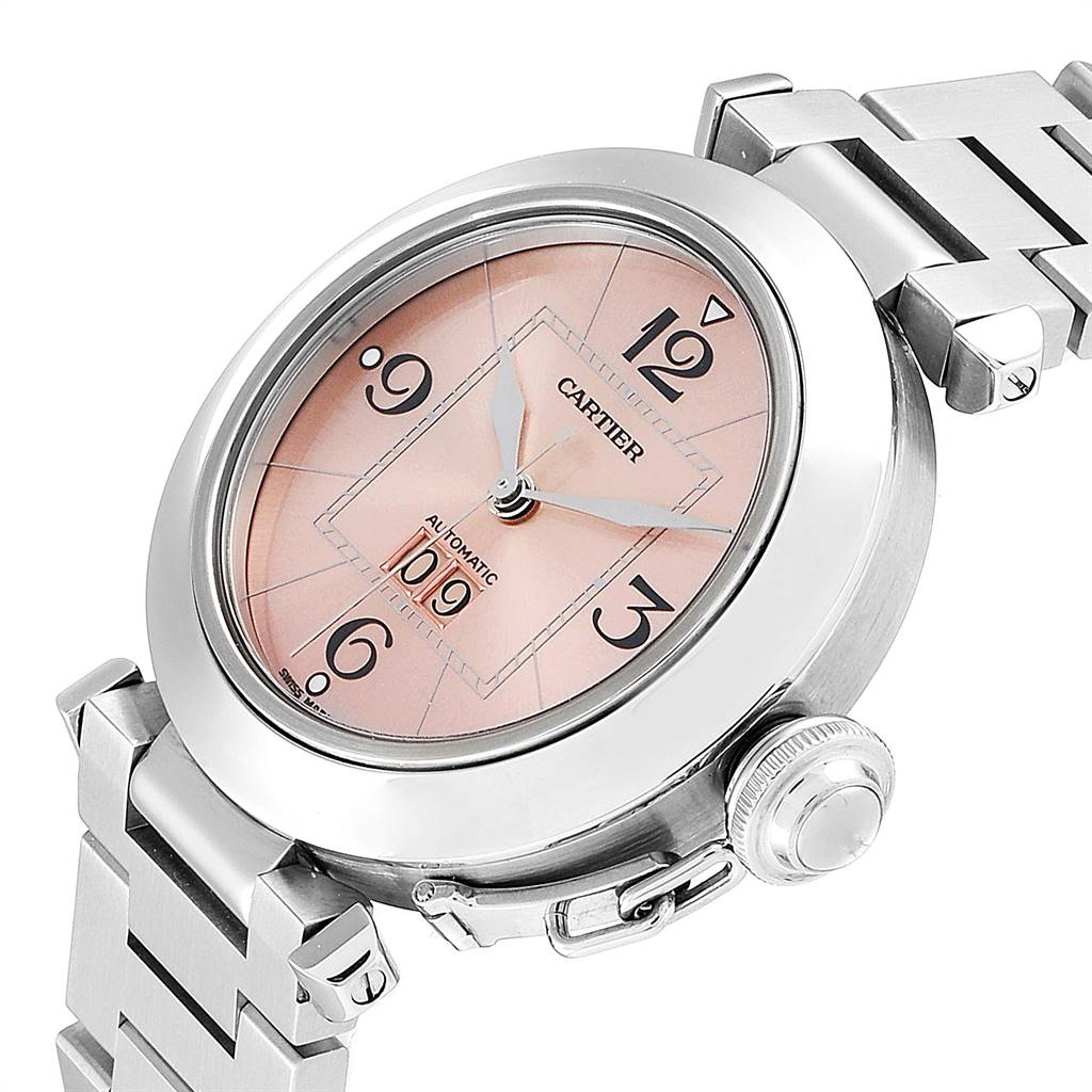 The image shows a close-up angle of the Cartier Pasha W31058M7 Women
s Stainless Steel Pink Dial W31058M7 Women
s Stainless Steel Pink Dial watch focusing on its face, bezel, crown, and part of the bracelet.