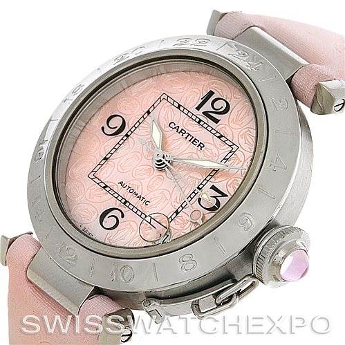 This image shows a Cartier Pasha W3109599 Women's Stainless Steel Mother of Pearl Dial W3109599 Women's Stainless Steel Mother of Pearl Dial watch with a pink face, silver bezel, Arabic numerals, and a pink leather strap from an angled perspective.