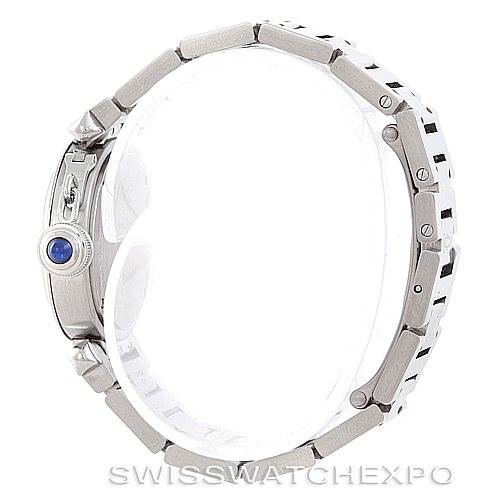 The image shows a side angle of a Cartier Pasha W31043M7 Women
s Stainless Steel Silver Dial W31043M7 Women
s Stainless Steel Silver Dial watch, featuring its stainless steel band and crown with a blue cabochon.