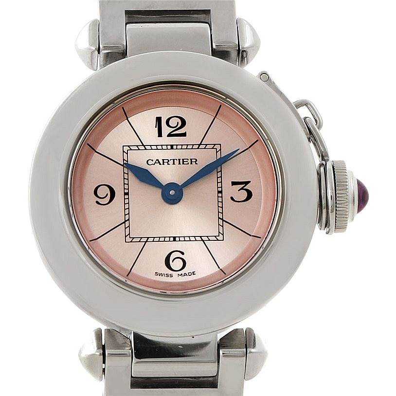 The image shows a close-up view of a Cartier Pasha W3140008 Women
s Stainless Steel Pink Dial W3140008 Women
s Stainless Steel Pink Dial watch, detailing its pink dial, blue hands, and part of its strap and crown.