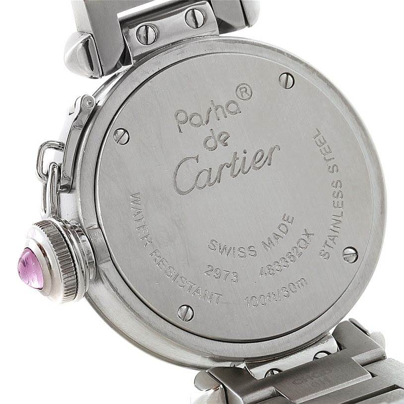 The image shows the back case of a Cartier Pasha W3140008 Women
s Stainless Steel Pink Dial W3140008 Women
s Stainless Steel Pink Dial watch, highlighting the inscriptions and a part of the strap.