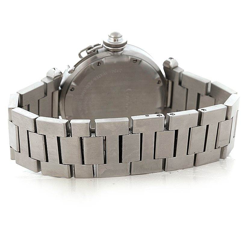 The image shows the back of a Cartier Pasha W31075M7 Women
s Stainless Steel Pink Dial W31075M7 Women
s Stainless Steel Pink Dial watch, highlighting its case and metal bracelet.