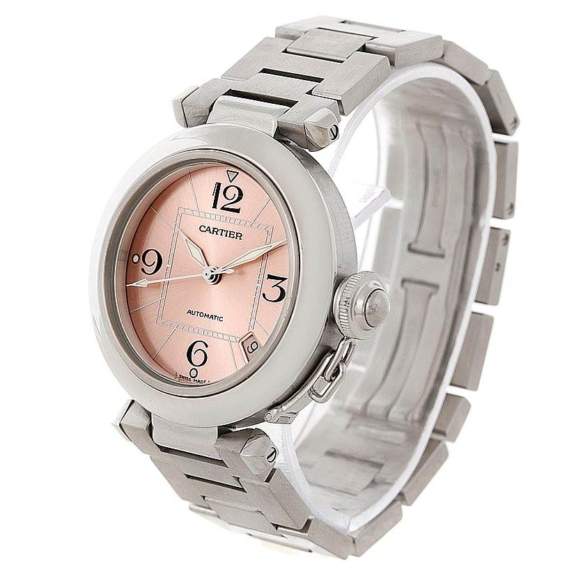 The Cartier Pasha W31075M7 Women
s Stainless Steel Pink Dial W31075M7 Women
s Stainless Steel Pink Dial watch is shown at a three-quarter angle, displaying the face, bracelet, and crown.