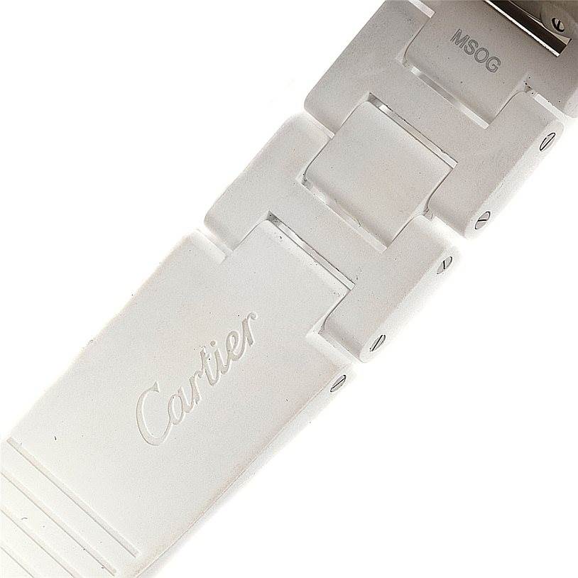The image shows a close-up of the bracelet clasp of a Cartier Pasha W3140004 Men
s Stainless Steel Silver Dial W3140004 Men
s Stainless Steel Silver Dial watch, featuring the Cartier logo.