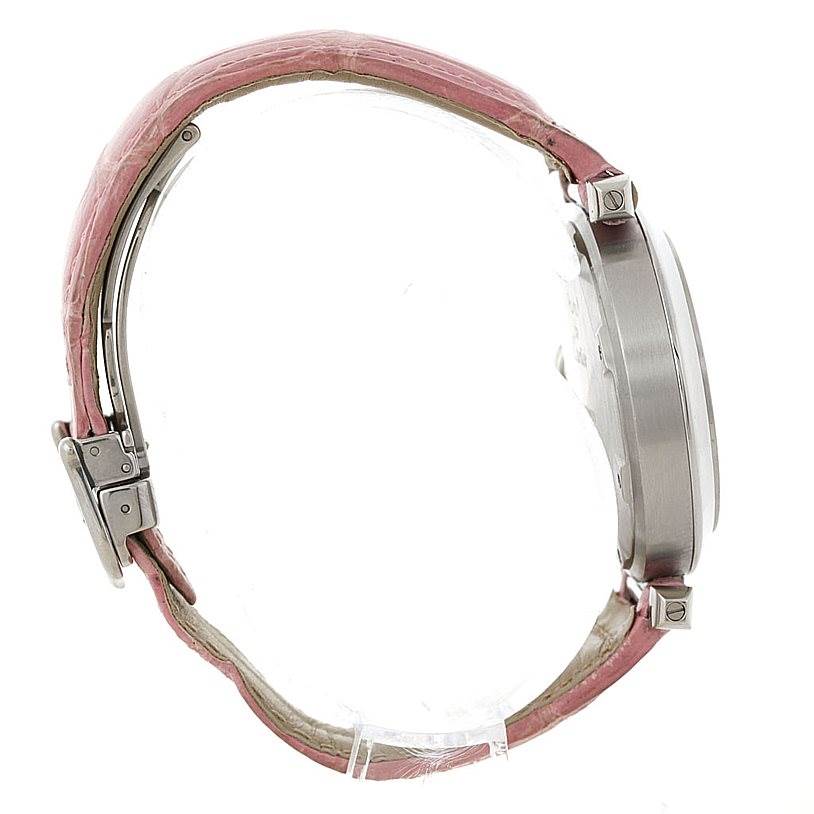 The image shows a side view of the Cartier Pasha W31015M7 Women's Stainless Steel White Dial W31015M7 Women's Stainless Steel White Dial watch, highlighting its pink leather strap and metal case.