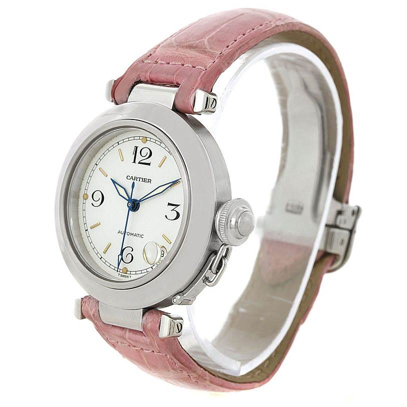 The Cartier Pasha W31015M7 Women's Stainless Steel White Dial W31015M7 Women's Stainless Steel White Dial watch is shown at a right angle, displaying its face, crown, and leather strap.