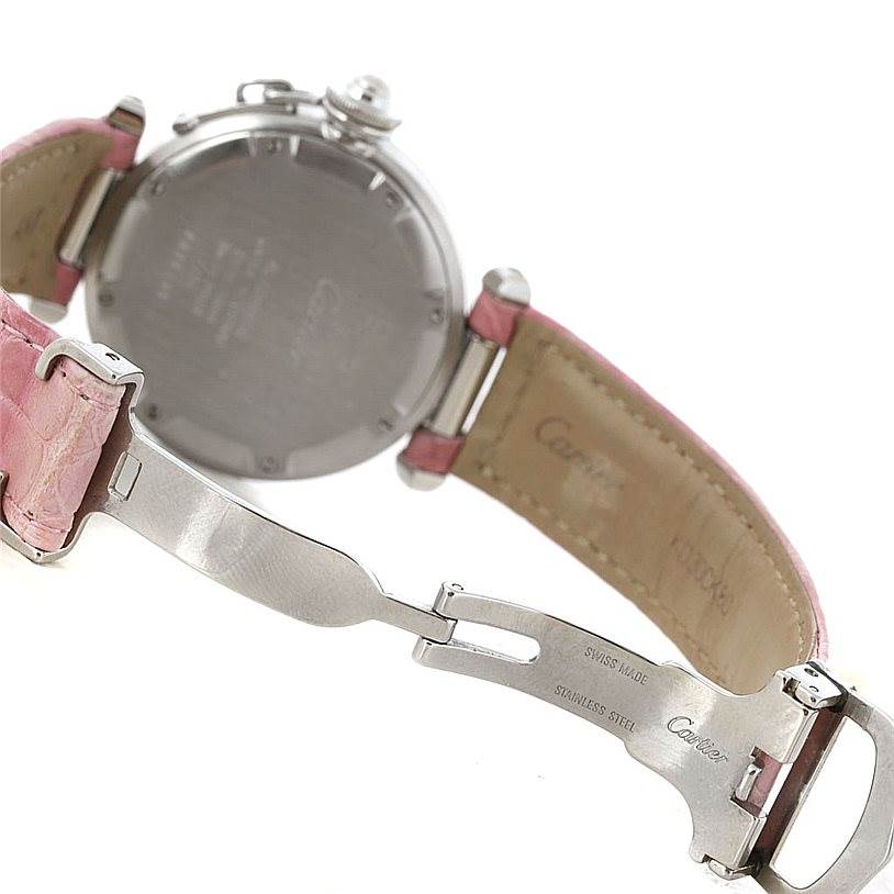 The image shows the back and clasp of a Cartier Pasha W31015M7 Women's Stainless Steel White Dial W31015M7 Women's Stainless Steel White Dial watch with a pink leather strap and stainless steel components.