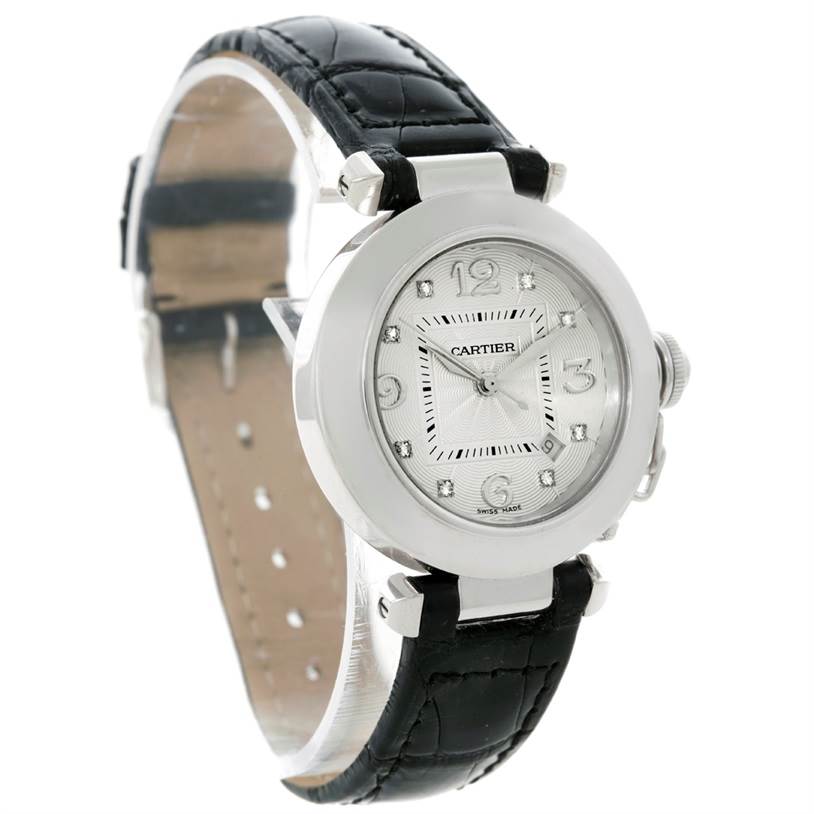 The Cartier Pasha WJ11902G Women's White Gold Silver Dial WJ11902G Women's White Gold Silver Dial watch is shown at an angle displaying its round face, bezel, and black leather strap.