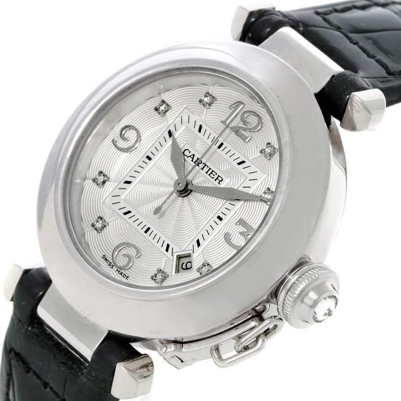 The image shows a Cartier Pasha WJ11902G Women's White Gold Silver Dial WJ11902G Women's White Gold Silver Dial watch at an oblique angle, highlighting the face, crown, and black leather strap.