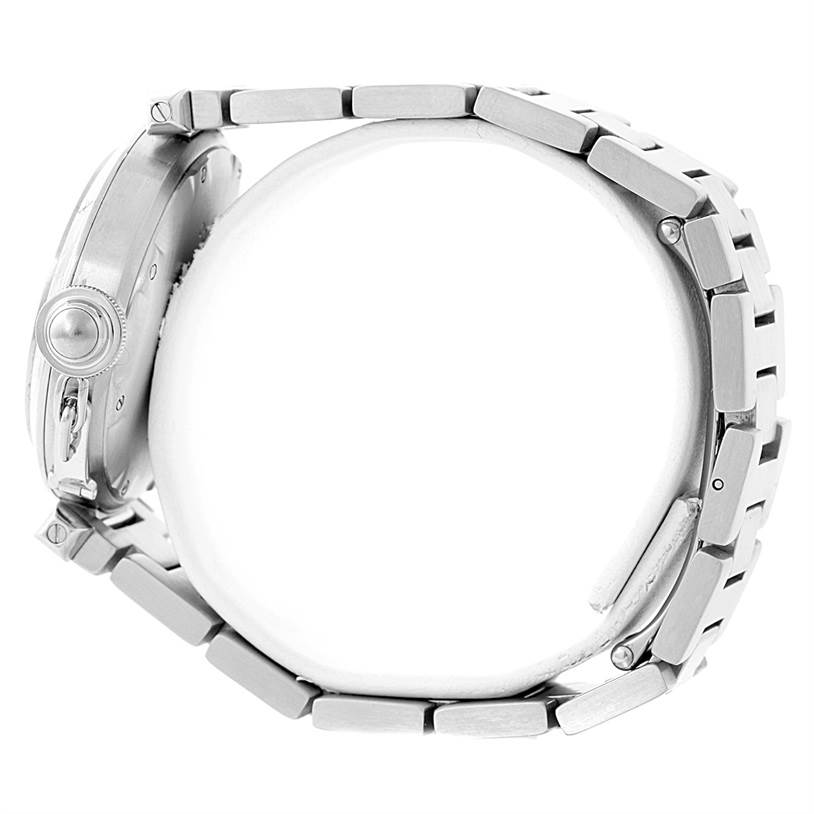 This side view of the Cartier Pasha W31023M7 Stainless Steel Pink Dial W31023M7 Stainless Steel Pink Dial watch showcases its case, crown, and metallic link bracelet.