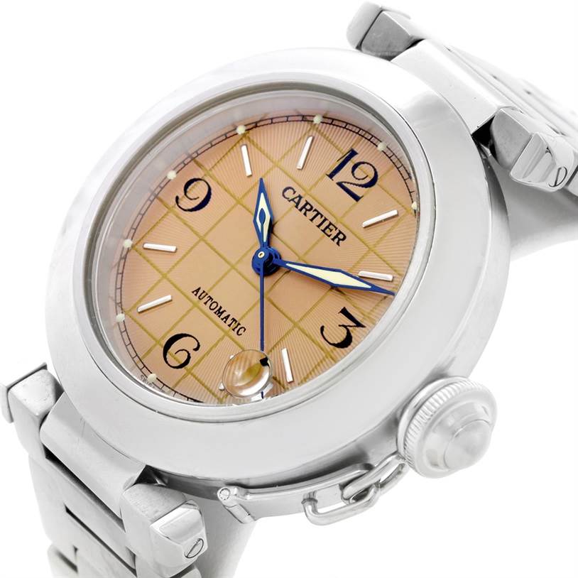 The image shows a Cartier Pasha W31023M7 Stainless Steel Pink Dial W31023M7 Stainless Steel Pink Dial model watch from an angled view, highlighting the face, bezel, bracelet, and crown.