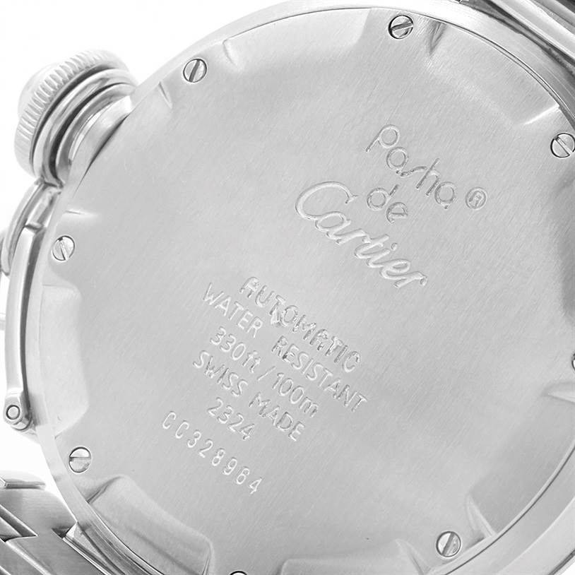 The image shows the back case and part of the crown of a Pasha de Cartier watch from a side angle.