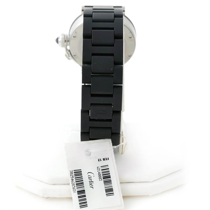 The image shows the back view of a Cartier Pasha W3140003 Women's Stainless Steel Black Dial W3140003 Women's Stainless Steel Black Dial model watch, focusing on its black strap and attached tags.