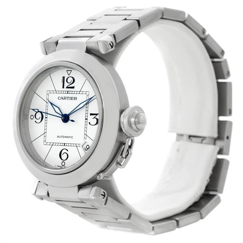 The image shows a side angle of the Cartier Pasha W31074M7 Women's Stainless Steel White Dial W31074M7 Women's Stainless Steel White Dial watch, highlighting its face, blue hands, and bracelet.