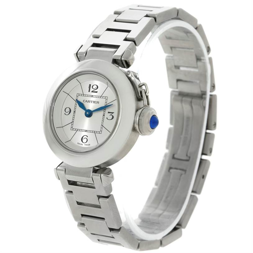 The Cartier Pasha W31043M7 Women
s Stainless Steel Silver Dial W31043M7 Women
s Stainless Steel Silver Dial watch is shown from a three-quarter angle, highlighting the face, bezel, bracelet, and crown with a blue accent.