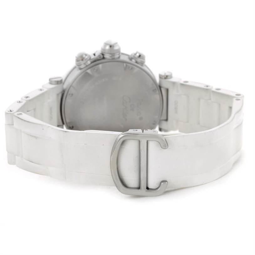 The image shows the backside of a Cartier Pasha W3140004 Stainless Steel Silver Dial W3140004 Stainless Steel Silver Dial watch, highlighting its white strap and clasp.