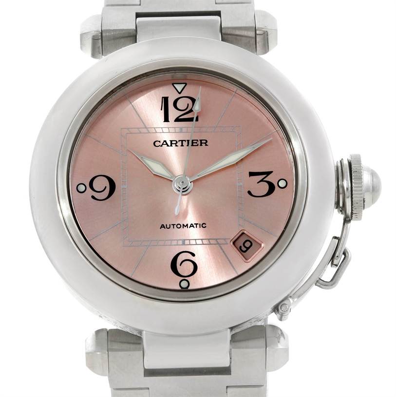 The image shows a front view of a Cartier Pasha W31075M7 Women
s Stainless Steel Pink Dial W31075M7 Women
s Stainless Steel Pink Dial model watch, highlighting its face, bezel, crown, and part of the bracelet.