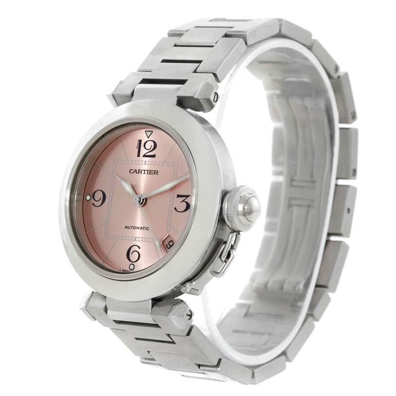 The Cartier Pasha W31075M7 Women
s Stainless Steel Pink Dial W31075M7 Women
s Stainless Steel Pink Dial watch is shown at a three-quarter angle displaying the case, dial, bracelet, and crown.