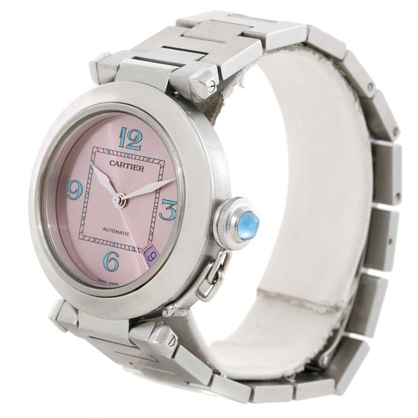 The image shows a side angle of the Cartier Pasha W3108199 Women's Stainless Steel Pink Dial W3108199 Women's Stainless Steel Pink Dial watch, highlighting the face, bezel, crown, and metal bracelet.