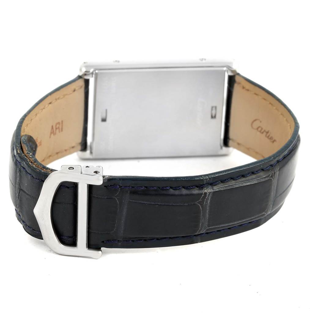 The image shows the back and strap of a Cartier Tank Basculante 2522 Men's Stainless Steel Silver Dial 2522 Men's Stainless Steel Silver Dial watch.