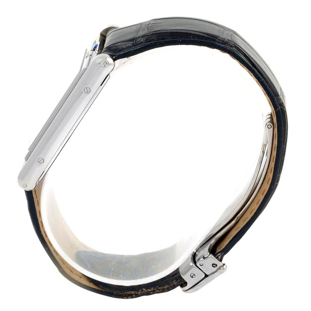 This image shows a side view of the Tank Basculante model by Cartier, highlighting the watch's profile and leather strap.