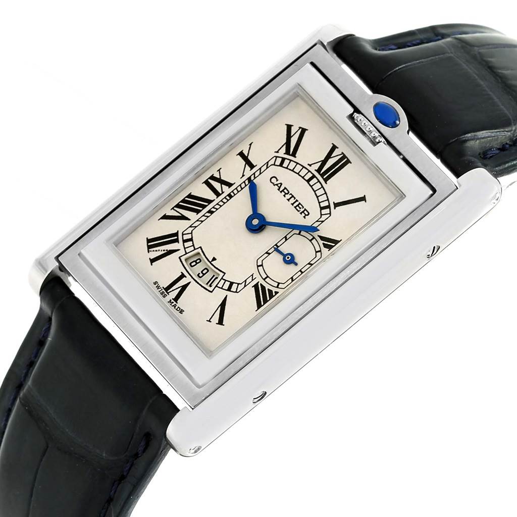 The Tank Basculante by Cartier is shown in a tilted angle, highlighting its watch face, crown, and leather strap.