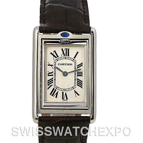 The image shows a frontal view of a Cartier Tank Basculante W1011358 Stainless Steel Silver Dial W1011358 Stainless Steel Silver Dial watch, highlighting its face, Roman numerals, and leather strap.