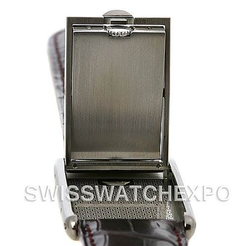 This image shows the back case of a Cartier Tank Basculante W1011358 Stainless Steel Silver Dial W1011358 Stainless Steel Silver Dial watch flipped open.