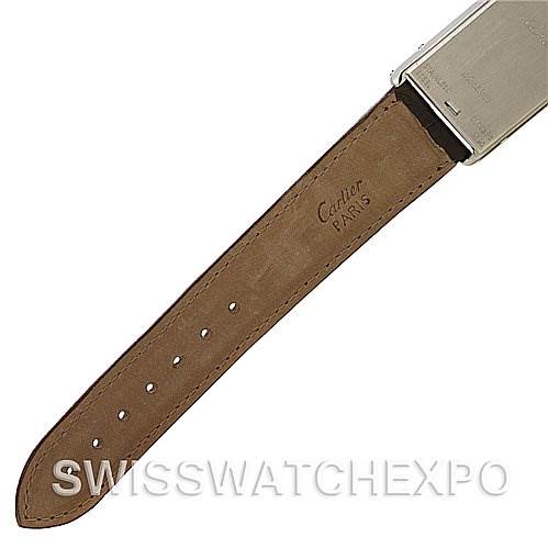 This image shows the strap and a partial view of the case back of a Cartier Tank Basculante W1011358 Stainless Steel Silver Dial W1011358 Stainless Steel Silver Dial watch.