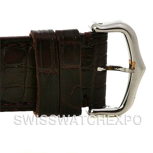 This image shows a close-up of the brown leather strap and silver buckle of the Cartier Tank Basculante W1011358 Stainless Steel Silver Dial W1011358 Stainless Steel Silver Dial watch.