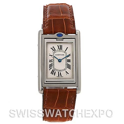 This image shows a frontal view of a Tank Basculante watch by Cartier, featuring its face, brown leather strap, and a sapphire cabochon crown.