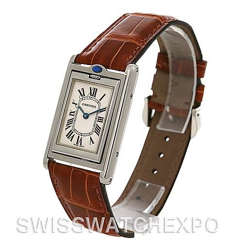 This image shows a Cartier Tank Basculante Stainless Steel Silver Dial Stainless Steel Silver Dial watch at a slight angle, highlighting the face, rectangular case, and brown leather strap.