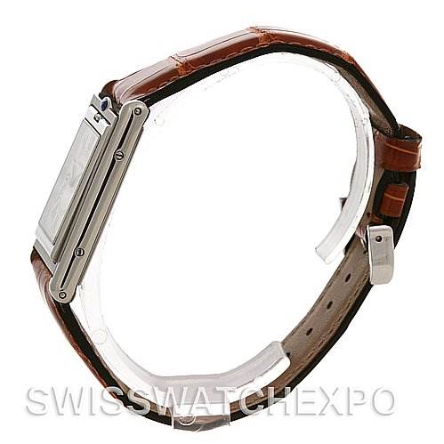 The image shows a side view of the Cartier Tank Basculante Stainless Steel Silver Dial Stainless Steel Silver Dial watch, highlighting its side profile and leather strap.