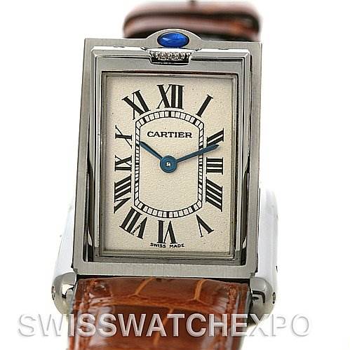This image shows the Tank Basculante model by Cartier, focusing on the watch face, casing, and a portion of the leather strap.
