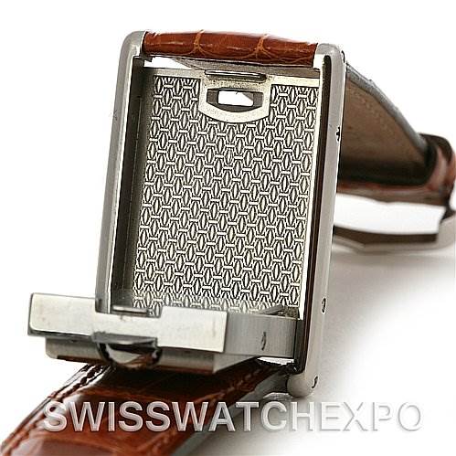 This image shows the back panel of the Cartier Tank Basculante Stainless Steel Silver Dial Stainless Steel Silver Dial watch with the case flipped open, revealing the intricate pattern inside.