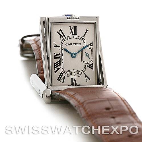 This image shows a Cartier Tank Basculante Stainless Steel Silver Dial Stainless Steel Silver Dial watch, tilted to the side, displaying its face with Roman numerals, along with its brown leather strap.