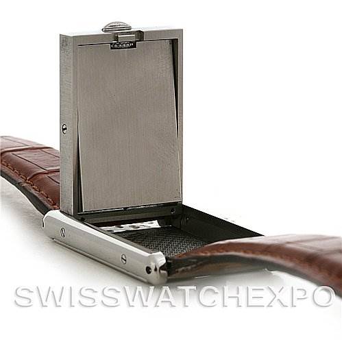 This image shows the Cartier Tank Basculante Stainless Steel Silver Dial Stainless Steel Silver Dial watch at an open angle, highlighting its unique reversible case mechanism and leather strap.