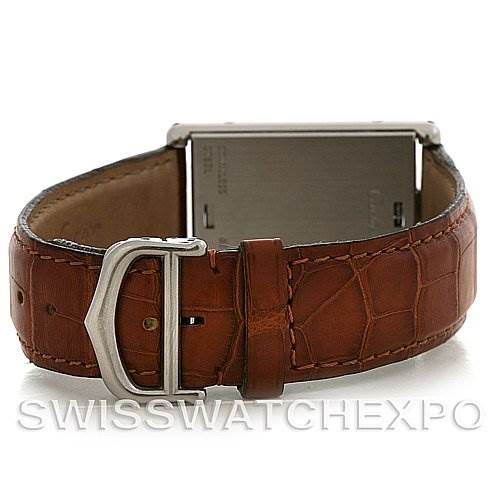 The image shows the back view of a Cartier Tank Basculante Stainless Steel Silver Dial Stainless Steel Silver Dial watch, focusing on the leather strap and buckle.