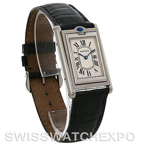 This image shows a profile view of the Cartier Tank Basculante Stainless Steel Silver Dial Stainless Steel Silver Dial watch, highlighting its face, Roman numerals, and black leather strap.