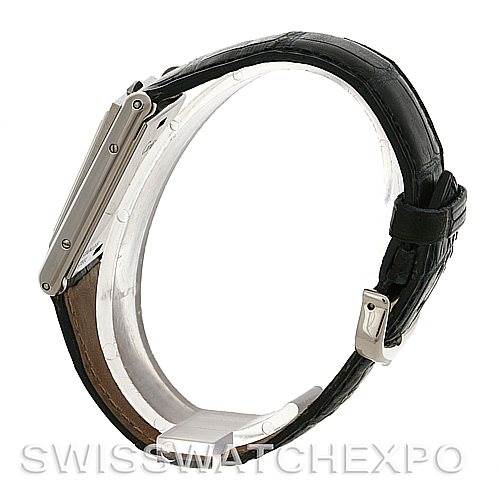 The image shows a side view of the Cartier Tank Basculante Stainless Steel Silver Dial Stainless Steel Silver Dial watch, emphasizing its profile and black leather strap.